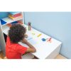 Black,Boy,Writing,In,Notebook.,Child,Sitting,At,The,Desk