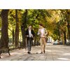 Photo,Of,Young,Businessmen,In,Suits,Walking,Outdoor,Through,Green