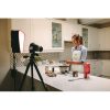 Young,Woman,Wearing,Apron,Filming,Herself,Preparing,Cake,In,The